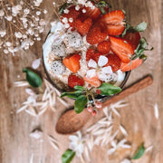 Coconut bowl with strawberries raspberries