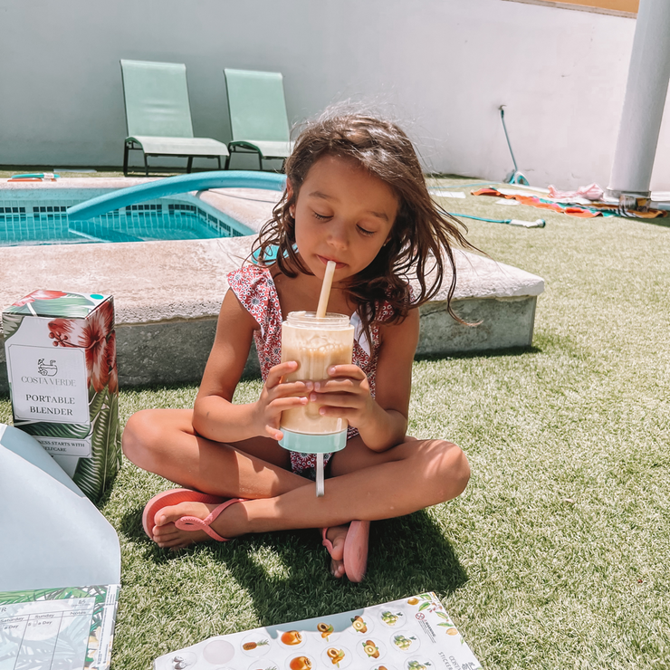 Girl drinking Fruit Smoothie 